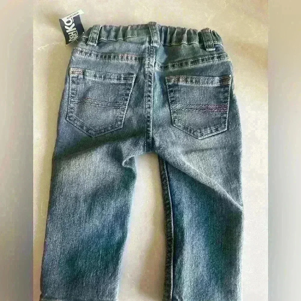 Brand new OshKosh dark blue jeans